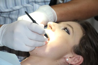 dentists working on a patient 